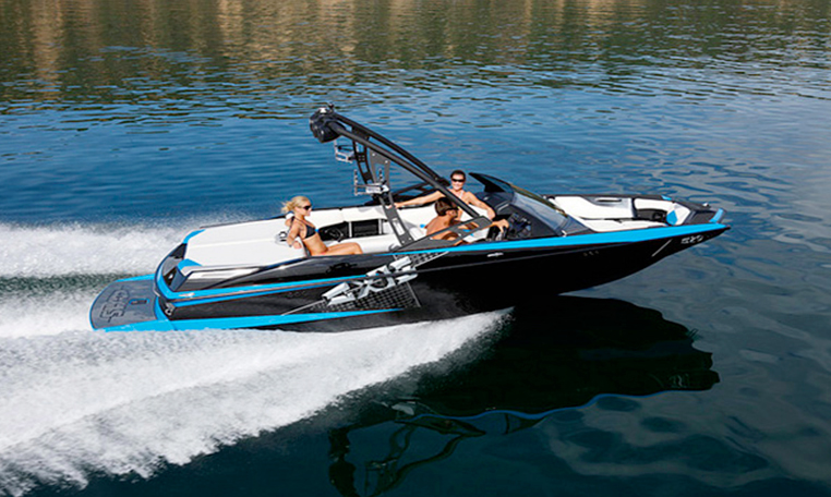 blue wakeboarding boat